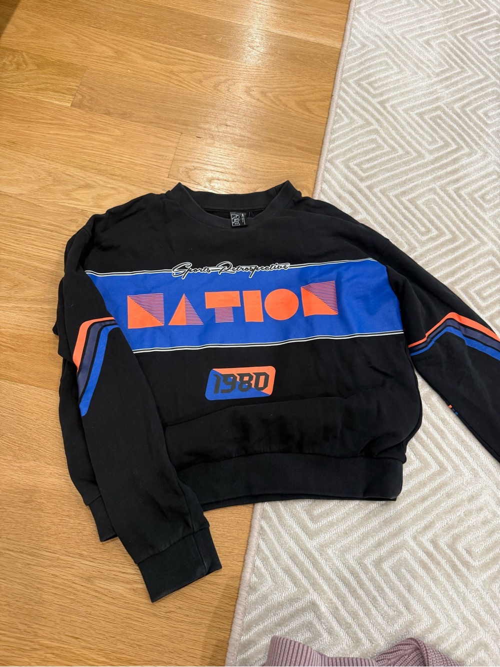 P.E Nation Black Sweatshirt with Blue & Orange Graphic Panels